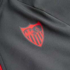CASTORE Tienda Para Aficionados^Sevilla FC Anthem Hombre Chaqueta de presentación TM1156-EBONYTRUERED